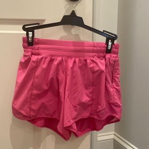 Pink lululemon hotty hot shorts